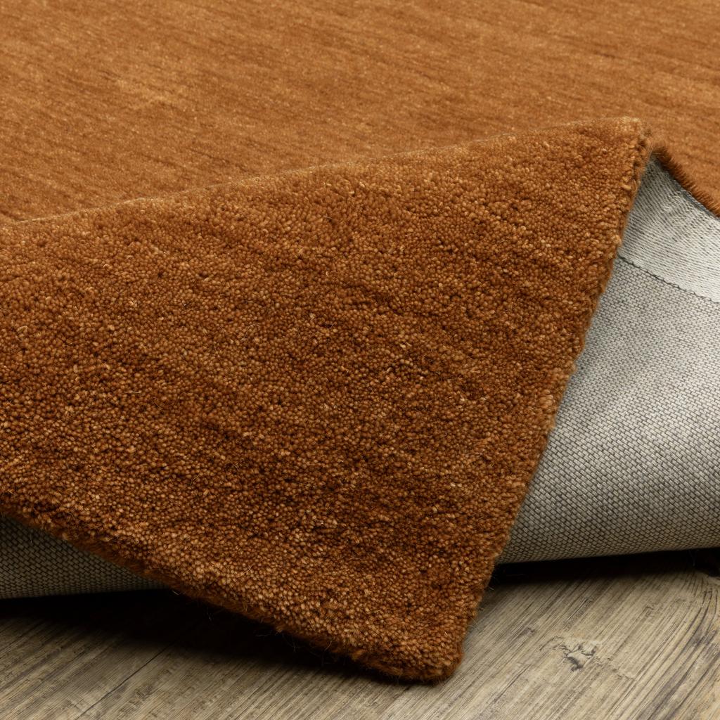 Oriental Weavers Aniston II 27118 Rust Rectangle Indoor Area Rug Solid Pattern-