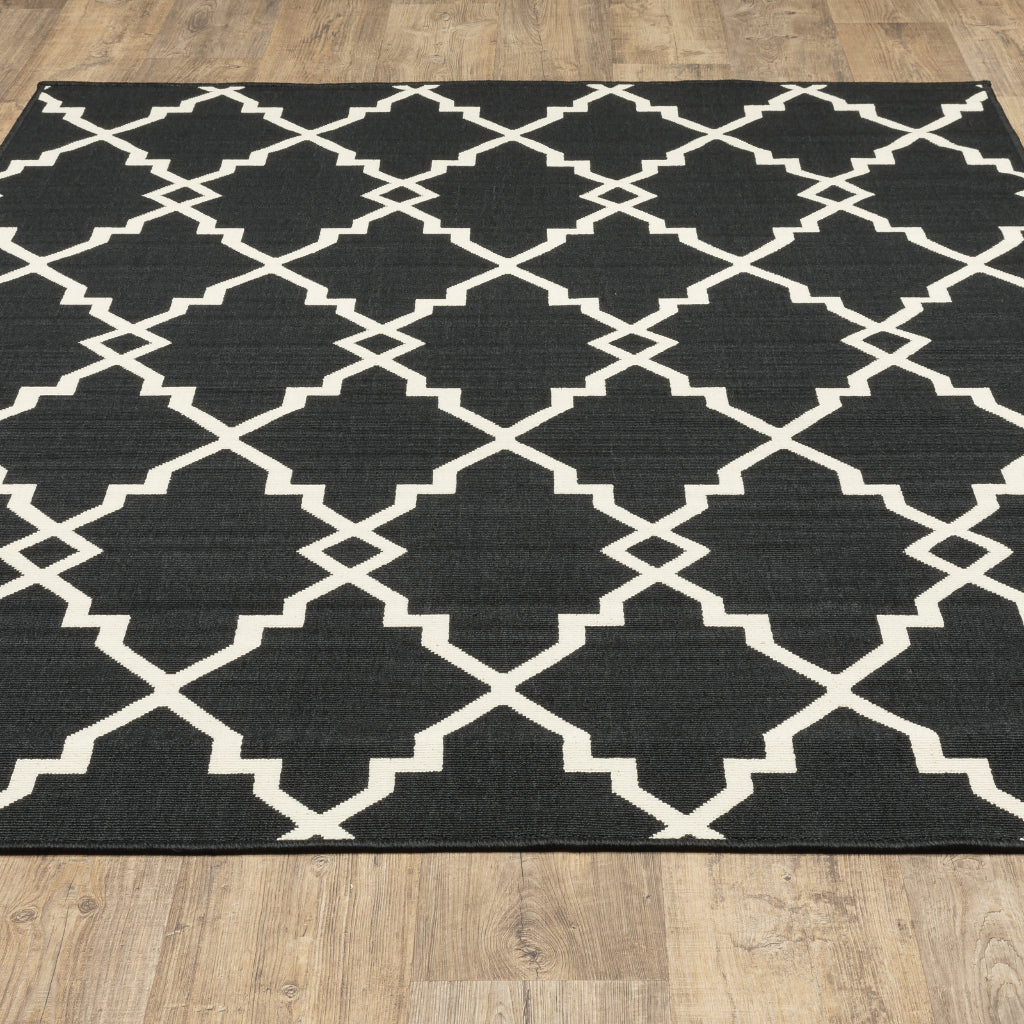 Oriental Weavers Marina 7763K Black/Ivory Rectangle Indoor / Outdoor Area Rug - Stain Resistant Machine Made Patio Rug with Geometric Pattern-