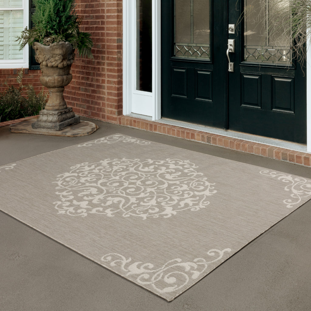 Oriental Weavers Portofino 6649W Taupe/Ivory Rectangle Indoor / Outdoor Area Rug - Stain Resistant Machine Made Patio Rug-