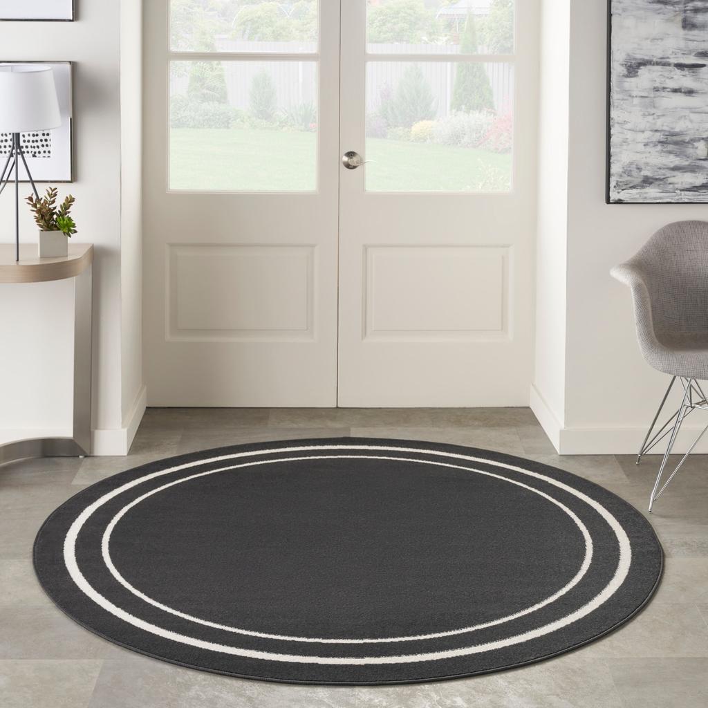 Nourison Home Nourison Essentials NRE02 Black Ivory Indoor/Outdoor Round Area Rug - Contemporary Power Loomed Machine Made Low Pile