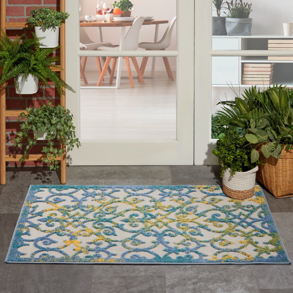 Nourison Home Aloha ALH21 Machine Made Blue Rectangle Area Rug - Stain Resistant Indoor & Outdoor Low Pile Rug with Yellow Accent-