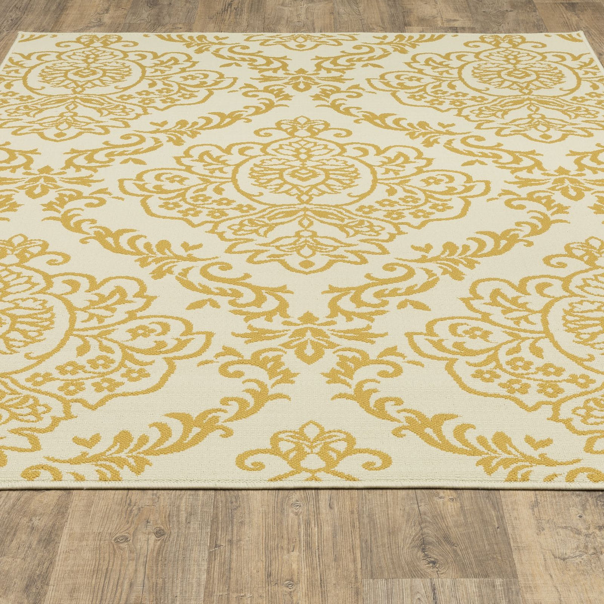 Oriental Weavers Bali 8424J Ivory/Gold Rectangle Indoor / Outdoor Area Rug - Trendy Stain Resistant Machine Made Patio Rug with Floral Pattern