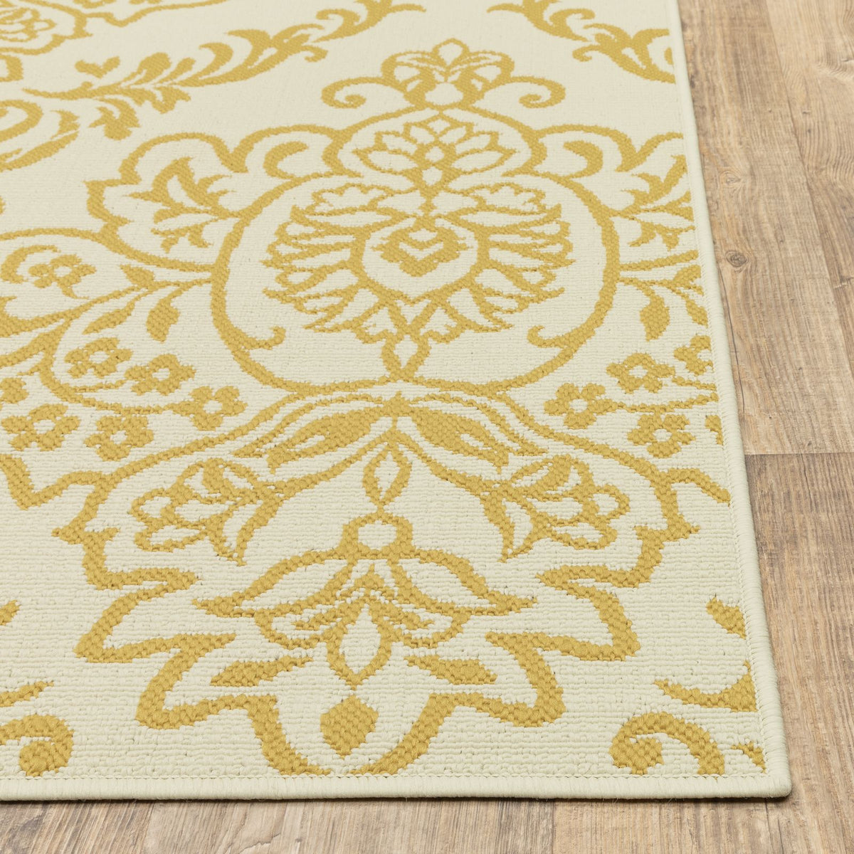 Oriental Weavers Bali 8424J Ivory/Gold Rectangle Indoor / Outdoor Area Rug - Trendy Stain Resistant Machine Made Patio Rug with Floral Pattern