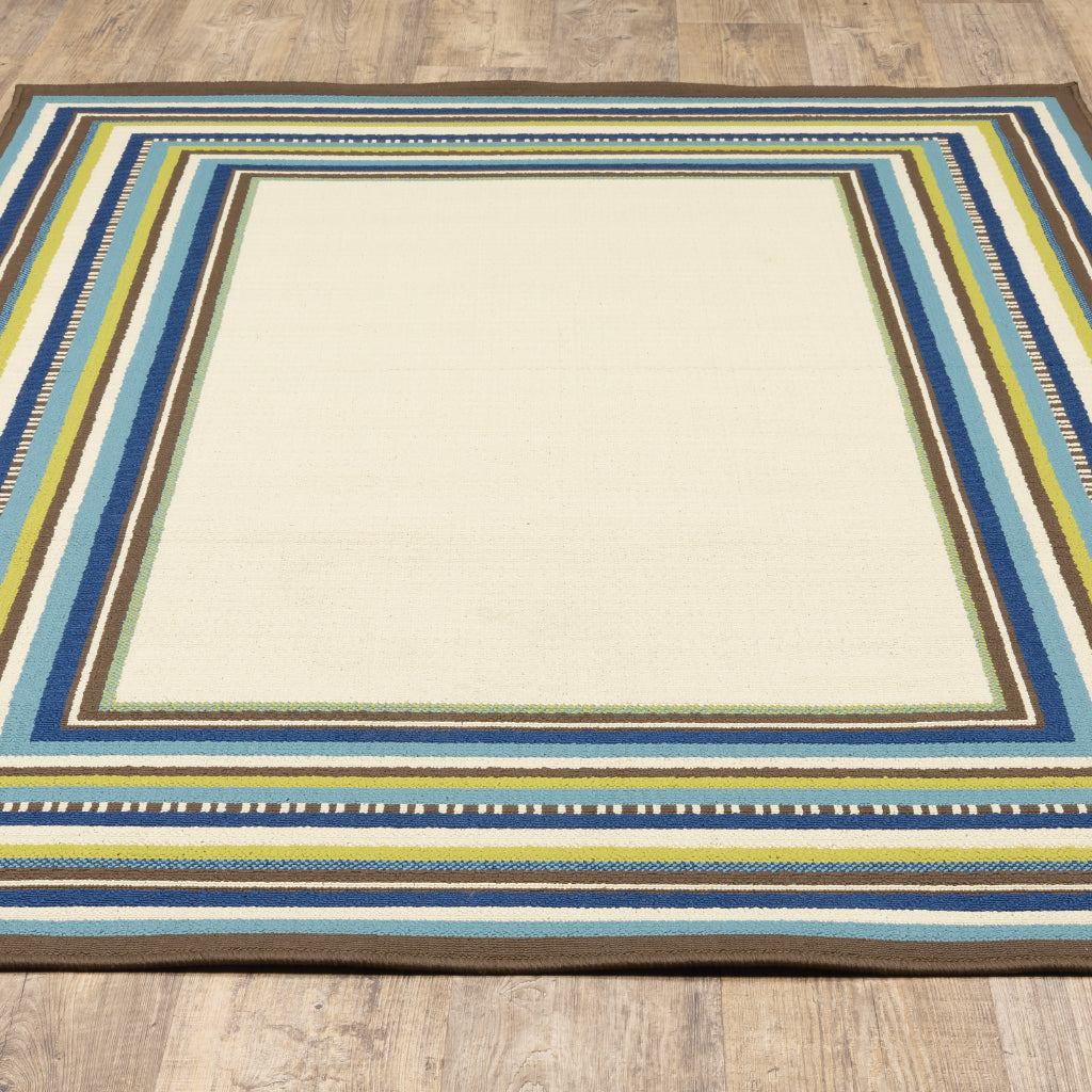 Oriental Weavers Caspian 1003X Ivory/Blue Rectangle Indoor / Outdoor Area Rug - Durable Stain Resistant Machine Made Patio Rug with Border Pattern