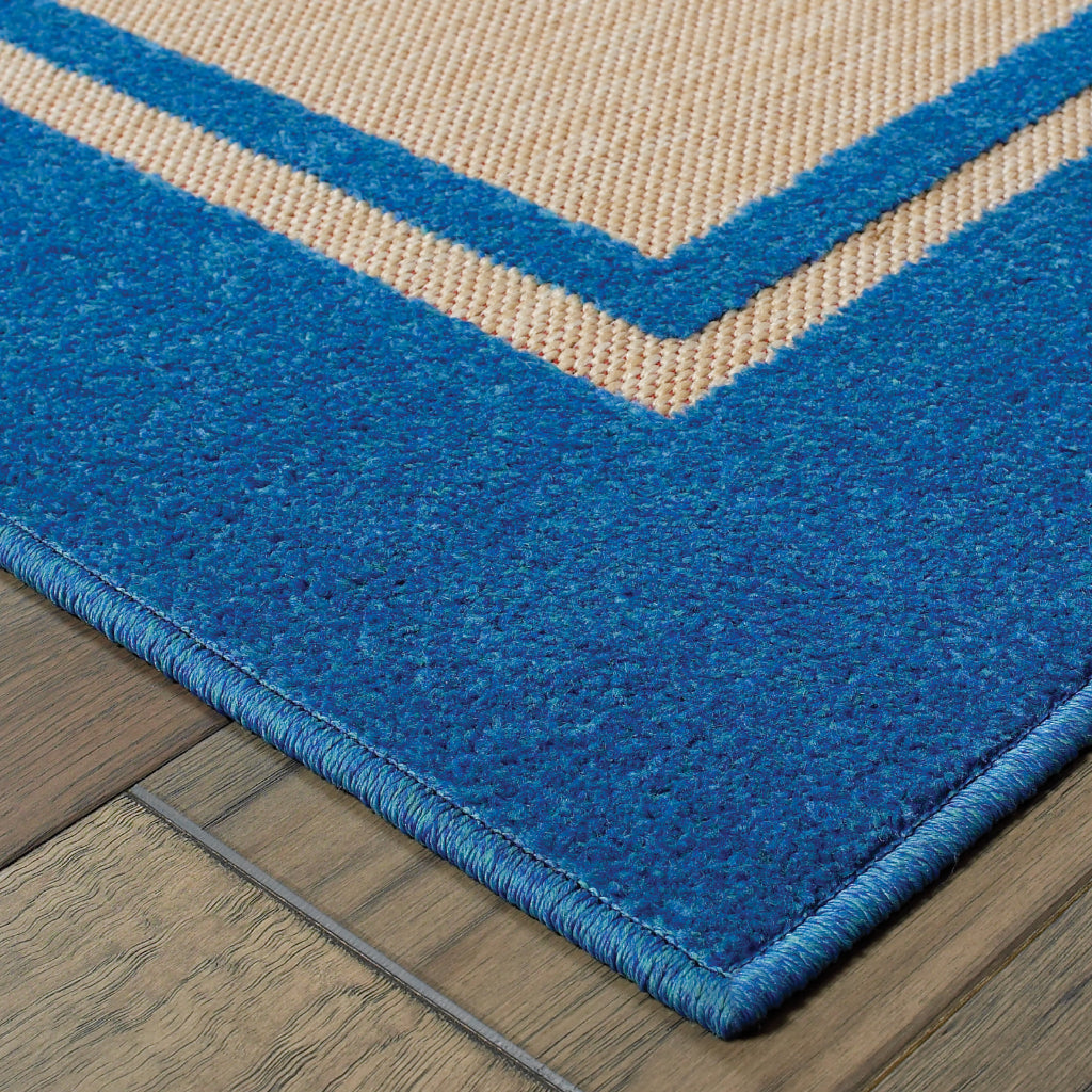 Oriental Weavers Cayman 5594B Sand/Blue Rectangle Indoor / Outdoor Area Rug - Stain Resistant Machine Made Patio Rug with Border Pattern