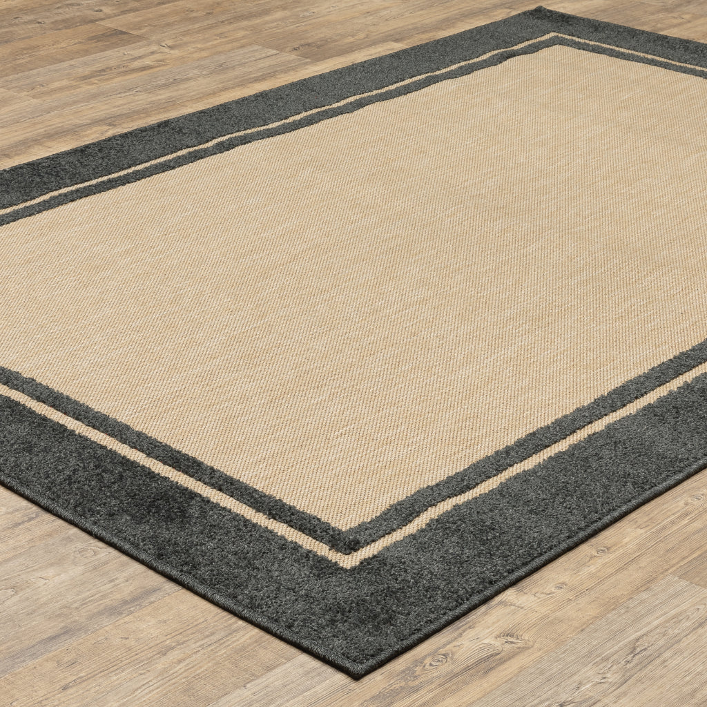 Oriental Weavers Cayman 5594K Sand/Charcoal Rectangle Indoor / Outdoor Area Rug - Stain Resistant Machine Made Patio Rug with Border Pattern