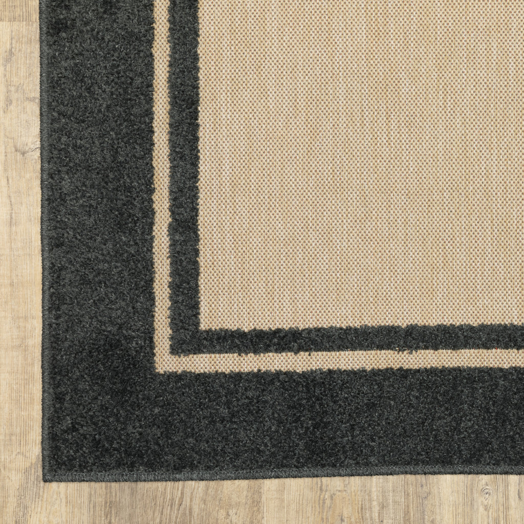 Oriental Weavers Cayman 5594K Sand/Charcoal Rectangle Indoor / Outdoor Area Rug - Stain Resistant Machine Made Patio Rug with Border Pattern