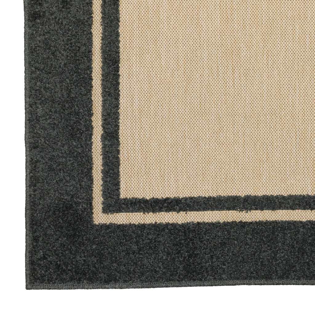 Oriental Weavers Cayman 5594K Sand/Charcoal Rectangle Indoor / Outdoor Area Rug - Stain Resistant Machine Made Patio Rug with Border Pattern