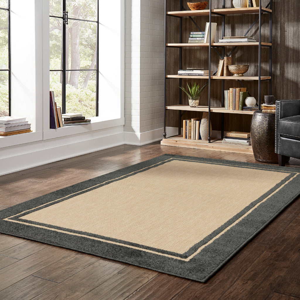 Oriental Weavers Cayman 5594K Sand/Charcoal Rectangle Indoor / Outdoor Area Rug - Stain Resistant Machine Made Patio Rug with Border Pattern
