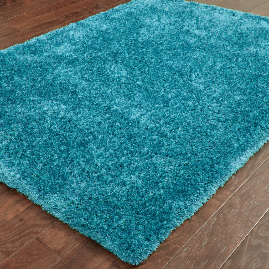 Oriental Weavers Cosmo 81104 Teal Rectangle Indoor Area Rug - Comfortable Stain Resistant Hand Tufted Shag Rug