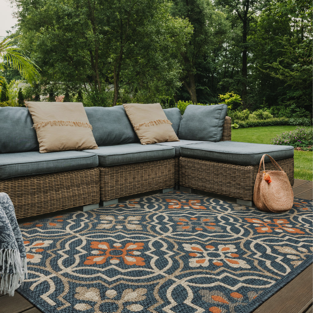 Oriental Weavers Latitude 709B3 Teal/Orange Rectangle Indoor / Outdoor Area Rug - Stain Resistant Machine Made Patio Rug with Floral Pattern