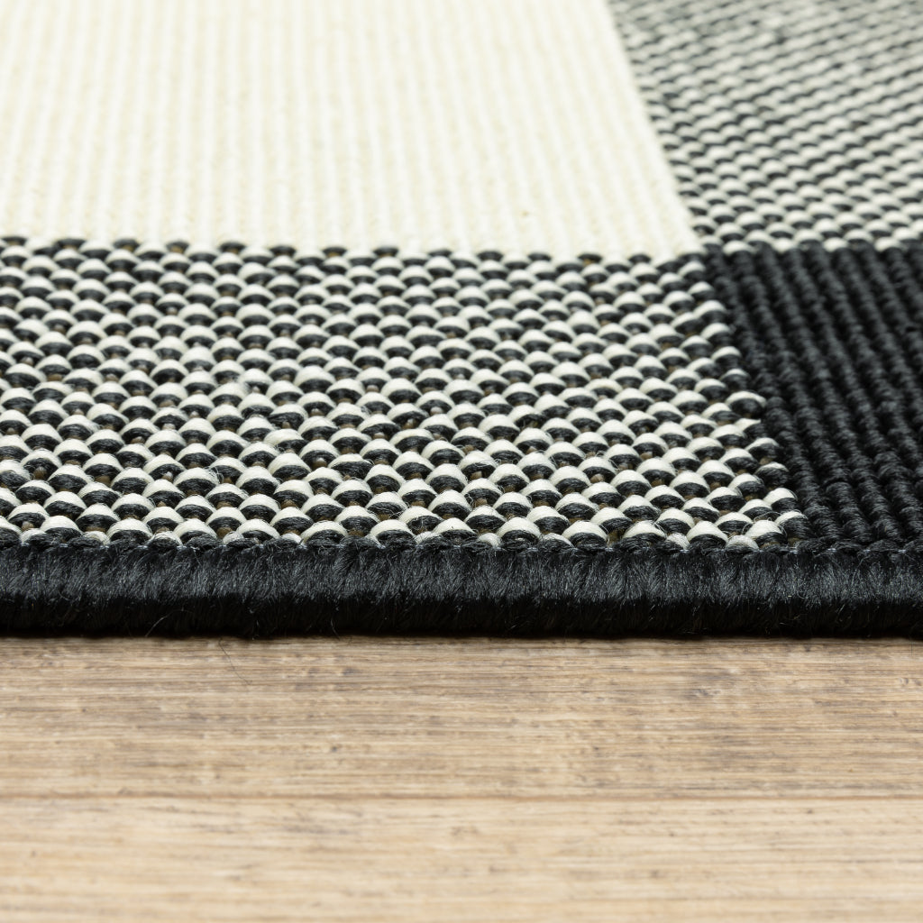 Oriental Weavers Marina 1932K Black/Ivory Rectangle Indoor / Outdoor Area Rug - Stain Resistant Machine Made Patio Rug with Geometric Pattern