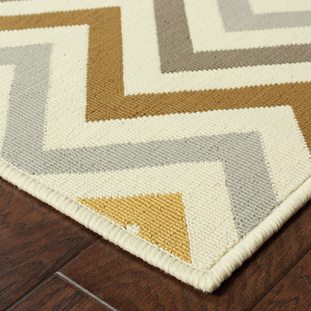 Oriental Weavers Riviera 4593A Grey/Gold Rectangle Indoor / Outdoor Area Rug - Stain Resistant Machine Made Patio Rug with Chevron Pattern