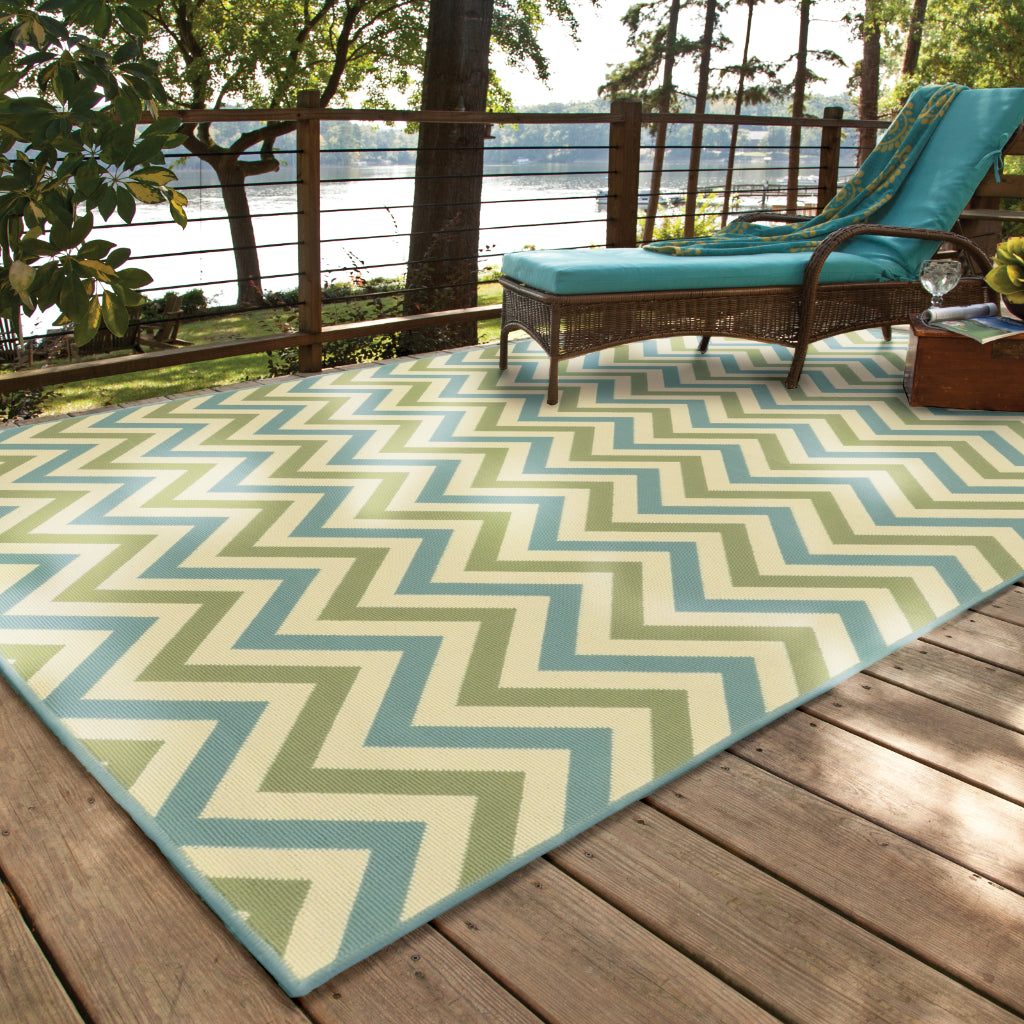 Oriental Weavers Riviera 4593U Green/Blue Rectangle Indoor / Outdoor Area Rug - Stain Resistant Machine Made Patio Rug with Chevron Pattern