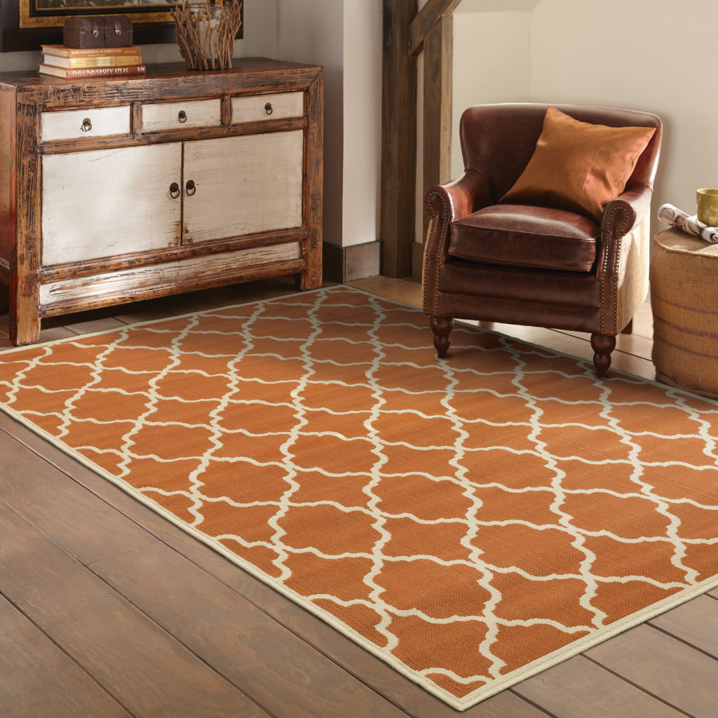 Oriental Weavers Riviera 4770D Burnt Orange/Ivory Rectangle Indoor / Outdoor Area Rug - Stain Resistant Machine Made Patio Rug with Trellis Pattern