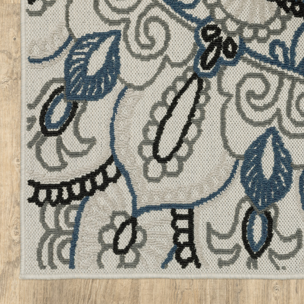 Oriental Weavers Torrey 072J1 Light Grey/Blue Rectangle Indoor / Outdoor Area Rug - Stain Resistant Machine Made Patio Rug with Medallion Pattern